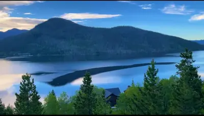 a view of a lake with a mountain in the background at Ski Shores- The Chalet cabin in Grand Lake