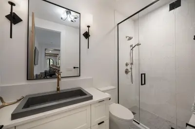a bathroom with a sink and a shower at Ski Shores- The Chalet cabin in Grand Lake