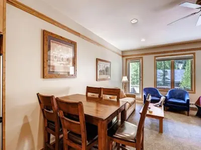 a dining room with a table and chairs at Keystone Slopeside Studio Condo in Keystone