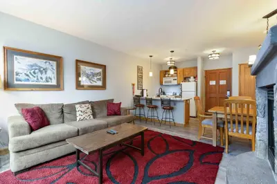 a living room with a couch and a table at 8045 Black Bear condo in Keystone