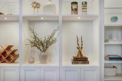 a room with white shelves with vases and books at 5 Ski Resorts within 16 Miles - Salt Water Hot Tub in Dillon