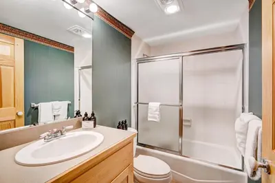a bathroom with a sink and a shower at Beautiful 5br Home at The Ranch - Kids Ski Free! condo in Keystone