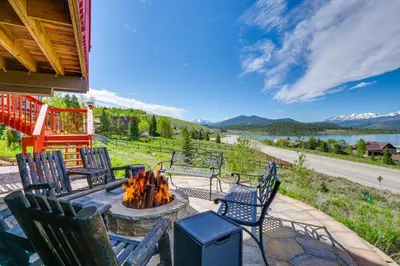 a group of chairs sitting around a fire pit at Hot Tub Relaxation Luxe Summit Gem with Mtn Views in Dillon