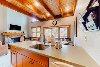 a kitchen with a sink and a counter top at The Seasons Keystone 2 Bedroom In Lakeside Village in Keystone