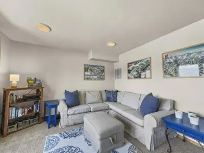 a living room with a couch and a table at 173 Buffalo Drive townhouse in Silverthorne