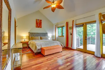 a bedroom with a bed and a ceiling fan at Frisco River Gem Close to Slopes, Trails and Main St in Frisco