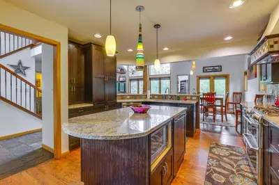 a kitchen with a large island in the middle at Frisco River Gem Close to Slopes, Trails and Main St in Frisco