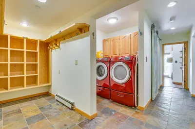 a laundry room with a washer and dryer at Frisco River Gem Close to Slopes, Trails and Main St in Frisco