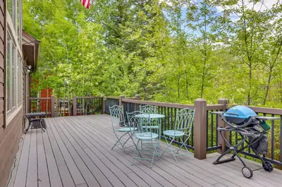 a deck with chairs and a grill and a table and chairs at Frisco River Gem Close to Slopes, Trails and Main St in Frisco