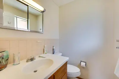 a bathroom with a sink and a toilet at Pet-Friendly Gem with Private Yard in Westminster! in Westminster