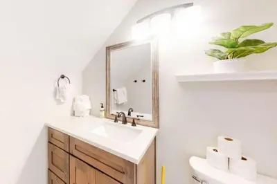 a bathroom with a sink and a mirror at Renovated Condo In West Keystone With Balcony, Hot Tub, Pool & Free Shuttle To Slopes! in Keystone