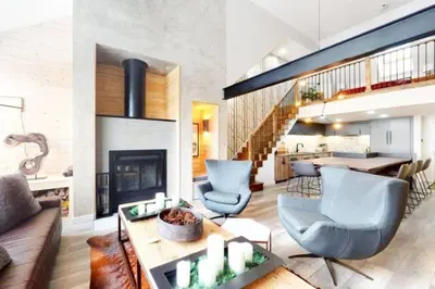 a living room with a couch and chairs and a fireplace at Renovated Condo In West Keystone With Balcony, Hot Tub, Pool & Free Shuttle To Slopes! in Keystone