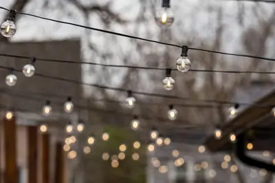 a bunch of lights hanging from a string at Wild West Disco Haus 2! New Hot Tub, Patio + Gym in Denver