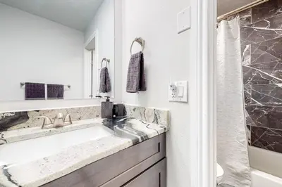 a bathroom with a sink and a shower at Cozy Colorado Condo in Dillon
