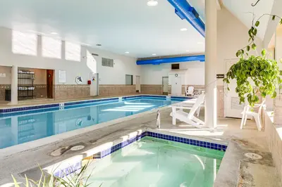 a large swimming pool in a house with a swimming pool at 1 Mi to Keystone Resort Mtn-View Family Escape! in Keystone