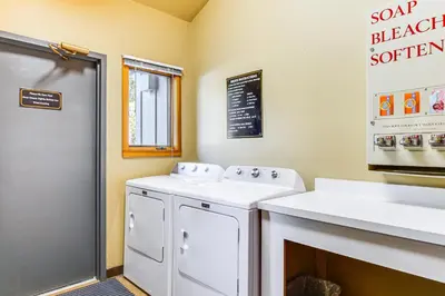 a laundry room with a washing machine and a sink at 1 Mi to Keystone Resort Mtn-View Family Escape! in Keystone