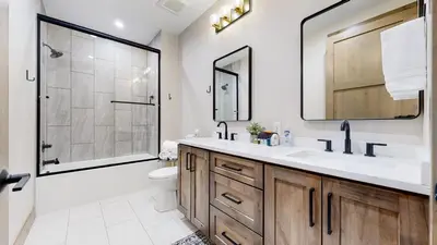 a bathroom with a toilet and a sink and a shower at Winter Park Condo w/Hot Tub & 4 Mi to Skiing in Winter Park