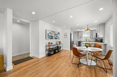 a kitchen and dining room with a table and chairs at 6224 S Datura St in Littleton