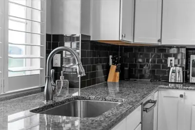 a kitchen with a sink and a counter top at The Retreat at Buffalo Run Golf Course - Commerce City in Henderson