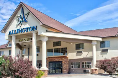 an office building with the entrance to an institution at Allington Inn & Suites Kremmling in Kremmling