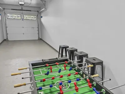 a gym with a table with balls on it at Hay Meadow Lodge townhouse in Fraser