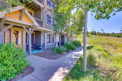 a house with a pathway in front of it at Ski-InandSki-Out, Scenic Mtn Views Granby Retreat! in Granby