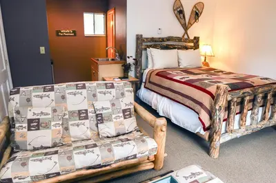 a bedroom with two beds in a room at Fawn Valley Inn- 256 apts in Estes Park