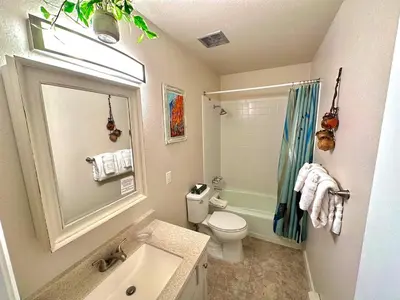 a bathroom with a sink and a toilet and a shower at Fawn Valley Inn- 288 condo in Estes Park