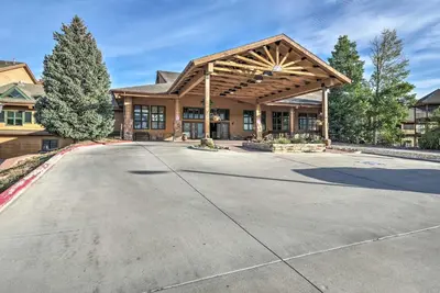 an empty driveway in front of a house at 2 Mi to Granby Ranch Granby Vacation Rental! in Granby