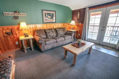 a living room with a couch and a coffee table at Lawn Lane B - #3383 in Estes Park