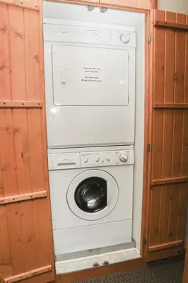 a washer and dryer in a small room at Lawn Lane B - #3383 in Estes Park