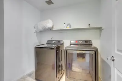 two machines sitting next to each other in a room at Near Rocky Mountain Arsenal Commerce City Home in Henderson