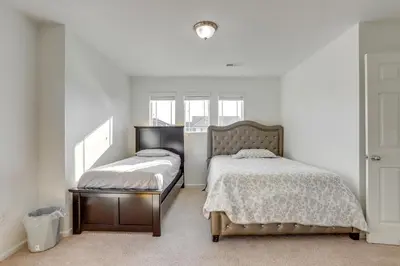 a bedroom with two beds and a window at Near Rocky Mountain Arsenal Commerce City Home in Henderson