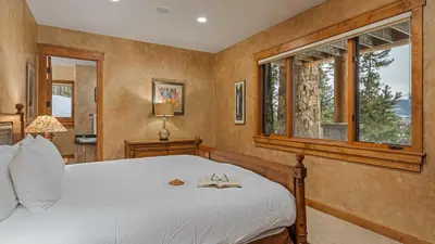 a bedroom with a bed and a window at Point View Place in Breckenridge