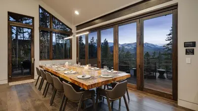 a large dining room with a long table and chairs at Vickerys Vantage in Breckenridge