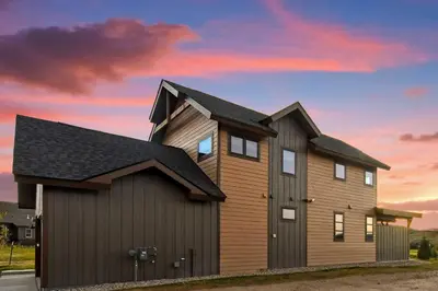a house with a gambrel roof at Colorado Home with Hot Tub! Close to Ski Resorts in Granby