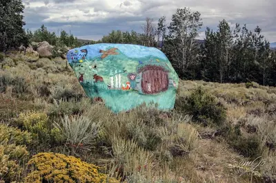 a vase sitting in the middle of a field at Red-tail Roundhouse at 22 West Cabins and Recreation in Hebron