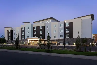 a large building with a street in front of it at TownePlace Suites by Marriott Denver North Thornton in Thornton