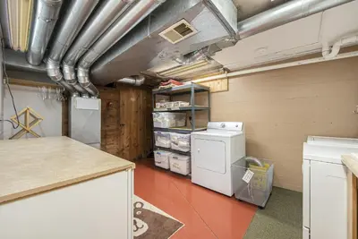 a laundry room with a washer and dryer at Your Vacation House ---EV#3216 home in Estes Park