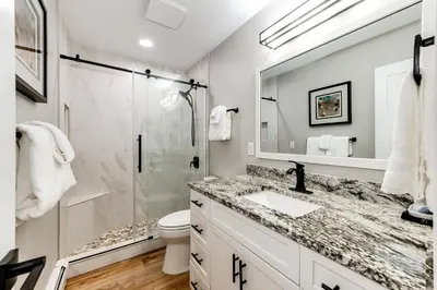 a bathroom with a shower and a sink and a toilet at Estes Park Vacation Rental 1 Mi to National Park in Estes Park
