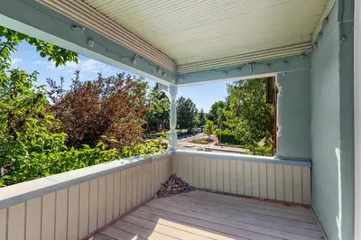 a covered porch with a view of a street at 151 W 2nd Ave - Denver in Denver
