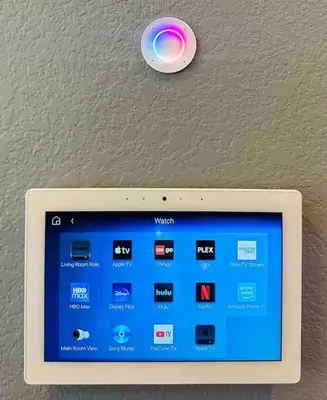 a tablet computer with a remote control on a ceiling at Downtown Denver Smart House in Denver