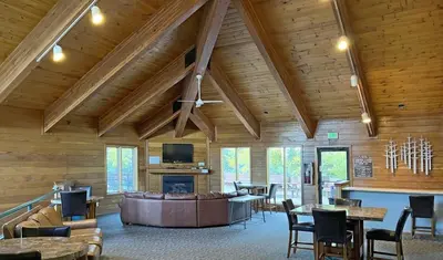 a living room with a couch and a fireplace at Tranquil 2BR Near Trails and Free Shuttle in Silverthorne