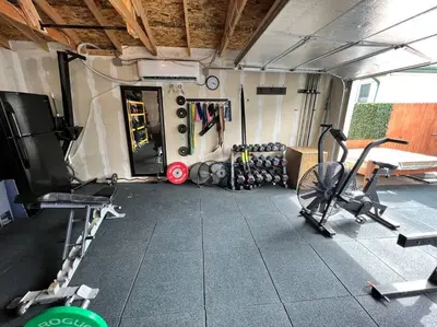 a room with a gym with bikes and weights at Luxury 3b-3b- Hot tub, Sauna, Personal Gym in Denver