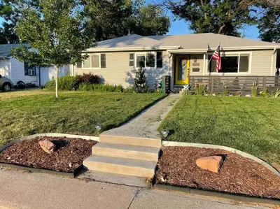 a house with some stairs in the front yard at Luxury 3b-3b- Hot tub, Sauna, Personal Gym in Denver