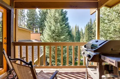 a screened in porch with a grill on a deck at Winter Park Condo with Sleeping Loft - Near Main St in Winter Park
