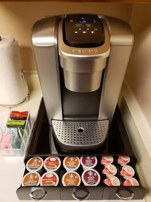 a coffee maker sitting on top of a coffee machine at Entire 1 BR Condo- Near Anschutz, UC Health, DIA- In-Unit Washer Dryer- Seasonal Discounts! in Aurora