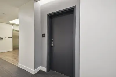 a door in a room with a wall at Southwestern Charm | Espadin LoHi in Denver
