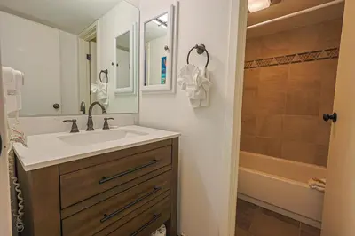 a bathroom with a sink and a bath tub at Wild Irishman 2 bed 2 bath retreat WIBH in Keystone