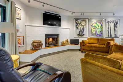 a living room with two couches and a fireplace at half Mi to Lake Dillon Mtn-View Condo in Frisco in Frisco